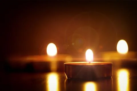 Background of candle lights burning with fire Stock Photos