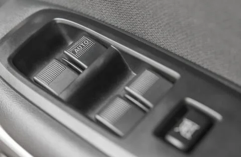 Background of car lock unlock buttons and window buttons. Stock Photos
