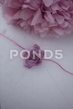 Background for a card with an artificial flower. Stock Photos