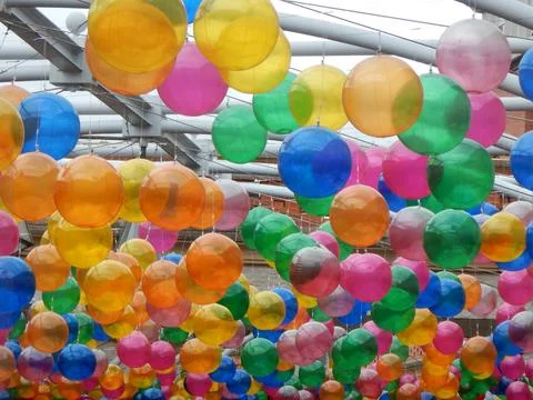 A background ceiling of colorful balloons Stock Photos