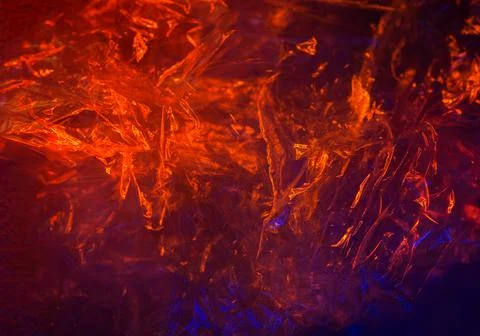 Background cellophane texture on a dark background. Abstract background of a  Stock Photos