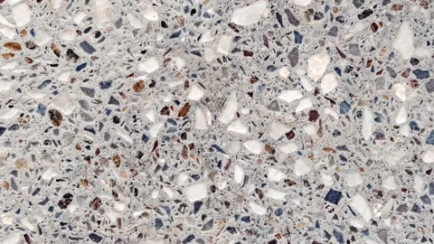 Background cement wall interspersed with multicolored rubble Stock-Footage 246851724