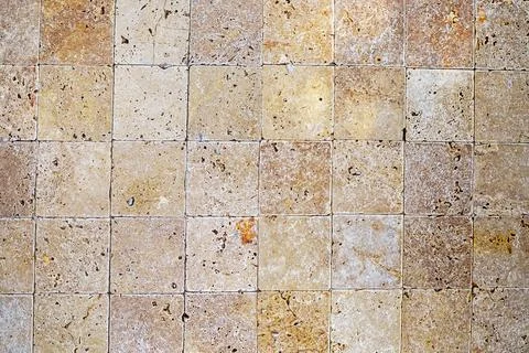 Background: ceramic square brown facing tile Stock Photos