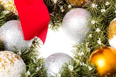 Background on a Christmas theme in the form of a frame of pine needles. Stock Photos