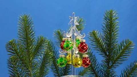 On a background of Christmas tree branches on a blue background Stock Footage 194726441