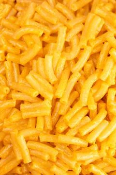 A Background of Classic Boxed Mac and Cheese Stock Photos