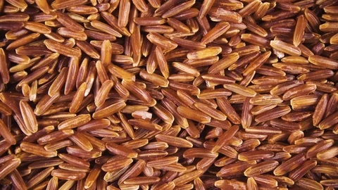 Background of clockwise rotating grain cereals top view Stock-Footage 99770156