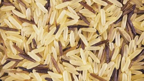 Background of clockwise rotating grain cereals top view Stock Footage 99770364