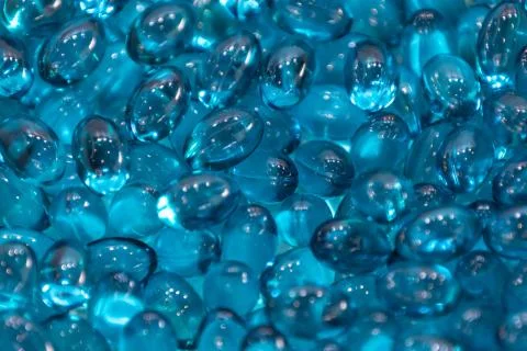 Background - close up of countless blue colourful medicine  pills Stock Photos