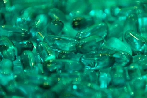 Background - close up of countless colourful green medicine  pills Stock Photos