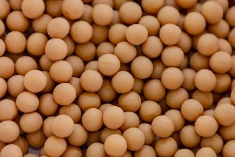Background - close up of countless colourful orange medicine  pills Stock Photos