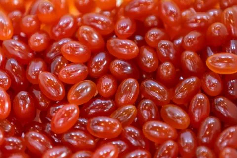 Background - close up of countless red colourful medicine  pills Stock Photos