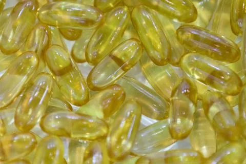 Background - close up of countless yellow colourful medicine  pills Stock Photos