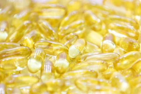Background - close up of countless yellow colourful medicine  pills Stock Photos