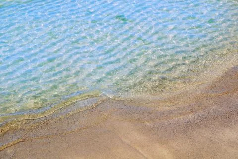 A background close up macro view of beautiful transparent clear soft sea wave Stock Photos