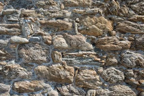 Background. Close up of a wall of a stone wall Stock Photos
