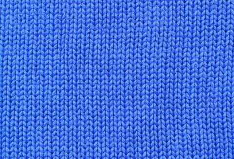 Background - closeup of blue knitted textile Stock Photos
