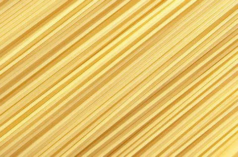 Background with closeup of spaghetti pasta Stock Photos