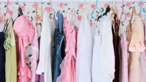 Background of cloth rack full of dresses. Stock Footage 99016573