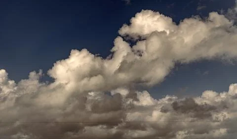 Background with cloud. Gloomy sky with overcast clouds. Skyscape and cloudscape Photos