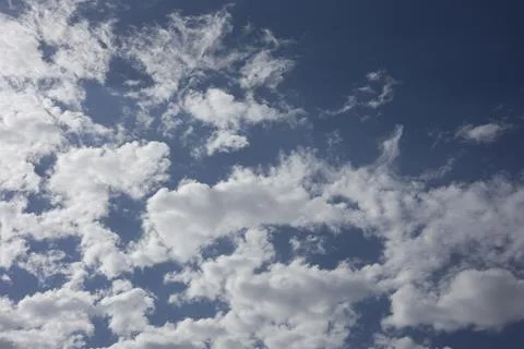Background From Clouds.  bright blue sky background texture with fluffy cloud Stock Photos
