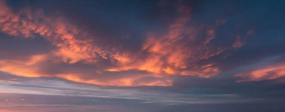 Background of cloudscape with beautiful clouds at sunset on sky Stock Photos