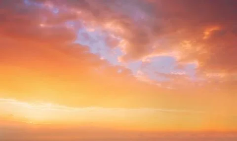 Background of cloudscape with beautiful orange sunset clouds on sky Stock Photos