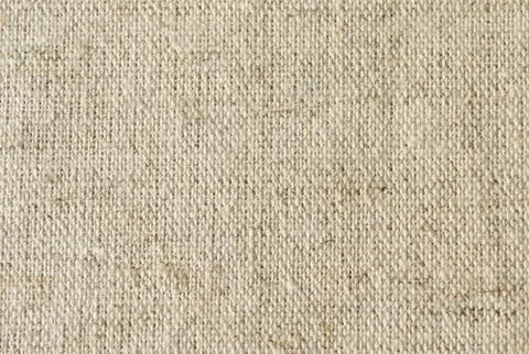 Background of coarse linen with a texture of threads and weaves Foto stock