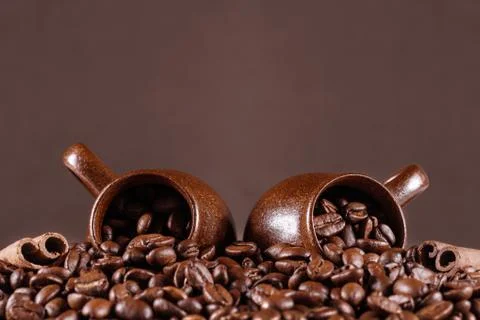 Background of coffee beans with cup Stock Photos