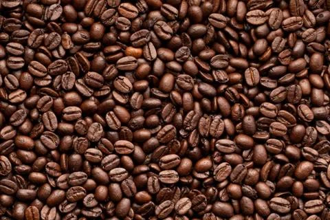 A background from coffee beans, roasted beans Stock Photos