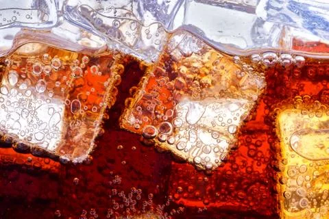 Background of cola with ice Stock Photos