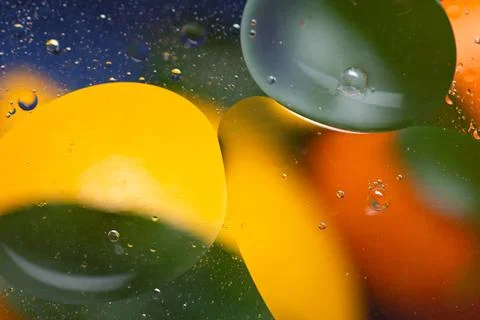 Background, colored babbles in water Stock Photos