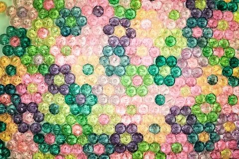 Background of colored beads, background of flowers made of colored beads Stock Photos