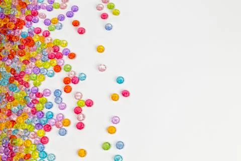 Background of colored beads on a white background Stock Photos