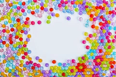 Background of colored beads on a white background Stock Photos