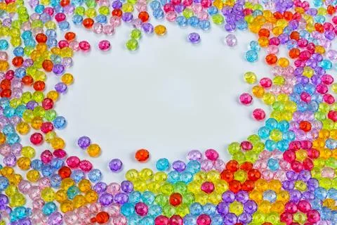 Background of colored beads on a white background Stock Photos