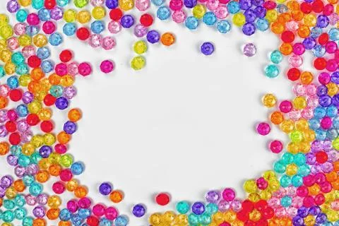Background of colored beads on a white background Stock Photos