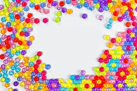 Background of colored beads on a white background Stock Photos