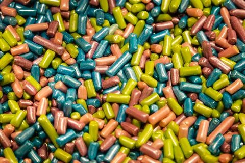 Background of colored chewy sweets, close up, top view. Stock Photos