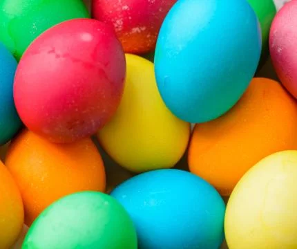 Background of colored Easter eggs. Stock Photos
