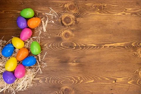 Background colored easter eggs on side Stock Photos
