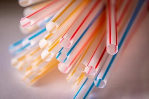 Background of Colored plastic straws, macro shot. Stock Photos