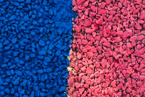 Background of colored small pebbles. The background is divided into two halves Foto stock