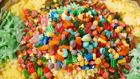 Background. Colorful abstract marshmallows and marmalade on market. Food texture Stock Footage 125170917