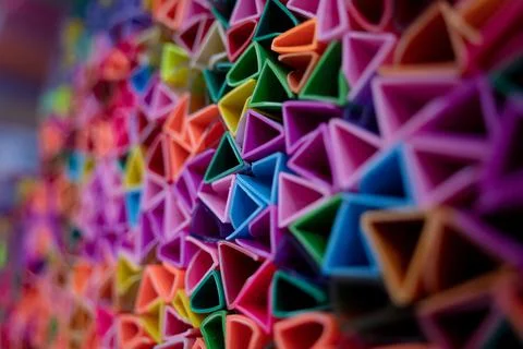 Background of colorful abstract texture with plastic triangles Stock Photos