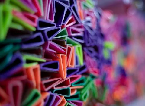 Background of colorful abstract texture with plastic triangles Stock Photos