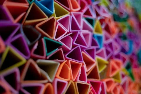 Background of colorful abstract texture with plastic triangles 스톡 사진