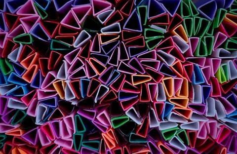 Background of colorful abstract texture with plastic triangles Stock Photos