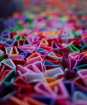 Background of colorful abstract texture with plastic triangles Foto stock
