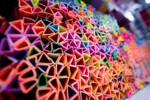 Background of colorful abstract texture with plastic triangles 스톡 사진